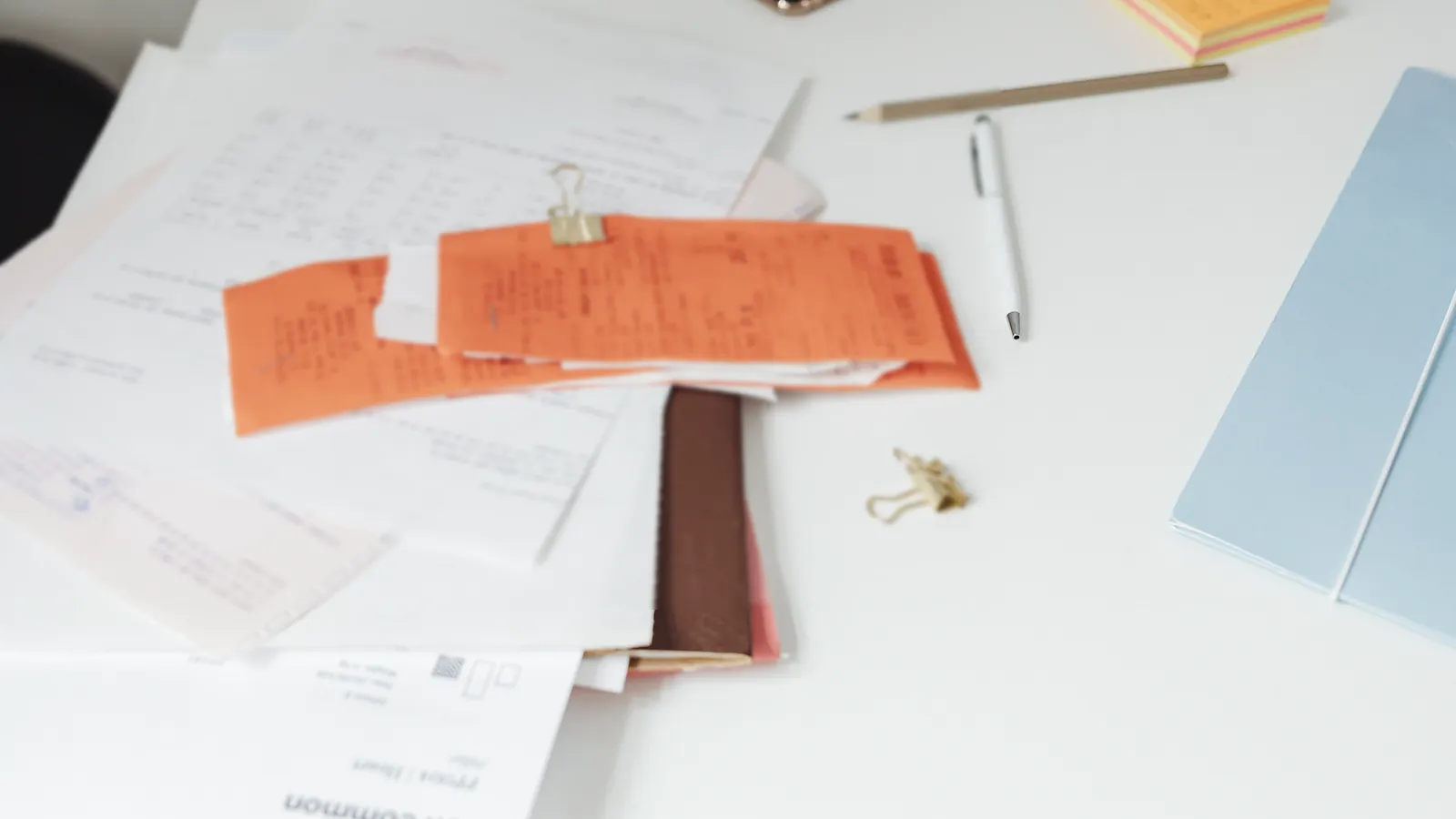 Organised GST and tax compliance documents arranged neatly on a desk